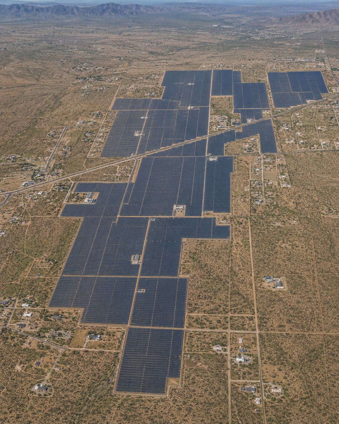 Rendering of a large solar field across desert land near rural homes